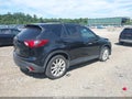 2014 Mazda CX-5 — photo 4 of 16 | VIN JM3KE4DYXE0381209