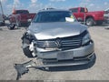 2013 Volkswagen Passat — photo 13 of 17 | VIN 1VWBP7A34DC100643