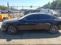 2016 Acura TLX — photo 13 of 15 | VIN 19UUB3F59GA001959