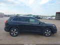 2015 Jeep Cherokee — photo 13 of 16 | VIN 1C4PJMDS9FW719672