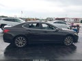 2015 Acura TLX — photo 13 of 16 | VIN 19UUB3F74FA000556