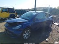 2022 Tesla Model Y — photo 2 of 18 | VIN 7SAYGAEE7NF465220