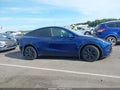 2024 Tesla Model Y — photo 12 of 15 | VIN 7SAYGDED1RF191950
