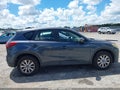 2013 Mazda CX-5 — photo 13 of 16 | VIN JM3KE2BE1D0119705