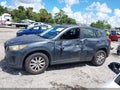 2013 Mazda CX-5 — photo 14 of 16 | VIN JM3KE2BE1D0119705