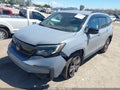 2022 Honda Pilot — photo 2 of 16 | VIN 5FNYF6H30NB061070