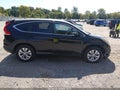 2014 Honda CR-V — photo 13 of 16 | VIN 5J6RM4H5XEL082774