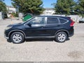 2014 Honda CR-V — photo 14 of 16 | VIN 5J6RM4H5XEL082774