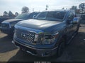 2019 Nissan Titan — photo 2 of 12 | VIN 1N6AA1E58KN519196