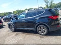 2016 Hyundai Santa Fe — photo 14 of 16 | VIN 5XYZUDLB9GG324973