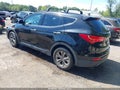 2016 Hyundai Santa Fe — photo 3 of 16 | VIN 5XYZUDLB9GG324973
