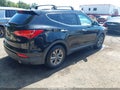 2016 Hyundai Santa Fe — photo 4 of 16 | VIN 5XYZUDLB9GG324973