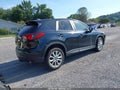 2015 Mazda CX-5 — photo 4 of 20 | VIN JM3KE4DY9F0460016