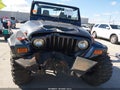 2004 Jeep Wrangler — photo 12 of 17 | VIN 1J4FA29164P700983