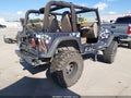 2004 Jeep Wrangler — photo 4 of 17 | VIN 1J4FA29164P700983