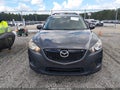 2014 Mazda CX-5 — photo 12 of 16 | VIN JM3KE2BE4E0336070