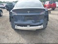 2024 Tesla Model Y — photo 6 of 16 | VIN 7SAYGDEE7RA285353