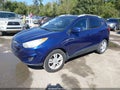 2011 Hyundai Tucson — photo 2 of 18 | VIN KM8JUCAC6BU225212