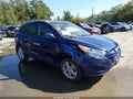 2011 Hyundai Tucson — photo 6 of 18 | VIN KM8JUCAC6BU225212