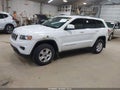 2015 Jeep Grand Cherokee — photo 2 of 16 | VIN 1C4RJFAG9FC954823