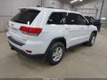2015 Jeep Grand Cherokee — photo 4 of 16 | VIN 1C4RJFAG9FC954823