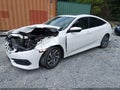 2016 Honda Civic — photo 2 of 17 | VIN 19XFC2F74GE070636