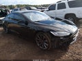 2015 Tesla Model S — photo 1 of 16 | VIN 5YJSA4H44FF083236