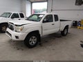 2015 Toyota Tacoma — photo 2 of 19 | VIN 5TFUU4EN8FX113745