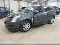 2013 Cadillac SRX — photo 2 of 14 | VIN 3GYFNGE36DS581889