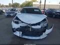 2016 Toyota Corolla — photo 12 of 16 | VIN 5YFBURHE4GP435296