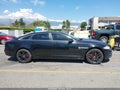 2014 Jaguar XJ-Series — photo 13 of 18 | VIN SAJWA2GZ6E8V69954