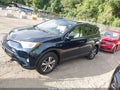 2018 Toyota RAV4 — photo 14 of 16 | VIN JTMRFREV8JJ252105