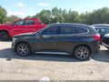 2018 BMW X1 — photo 14 of 16 | VIN WBXHT3C33J5F89847