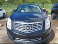 2013 Cadillac SRX — photo 12 of 16 | VIN 3GYFNCE38DS643866