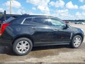 2013 Cadillac SRX — photo 13 of 16 | VIN 3GYFNCE38DS643866