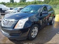 2013 Cadillac SRX — photo 2 of 16 | VIN 3GYFNCE38DS643866