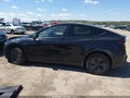 2026 Tesla Model Y — photo 14 of 18 | VIN 7SAYGDEE8TF437652