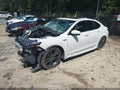 2018 Acura TLX — photo 2 of 16 | VIN 19UUB2F69JA008100