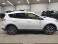2016 Toyota RAV4 — photo 13 of 16 | VIN JTMBFREVXGD196113