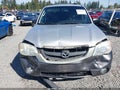 2004 Mazda Tribute — photo 12 of 18 | VIN 4F2YZ94104KM34574