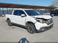 2020 Honda Ridgeline — photo 1 of 17 | VIN 5FPYK3F54LB030441