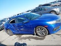 2018 Honda Civic — photo 13 of 16 | VIN 19XFC2F70JE012630