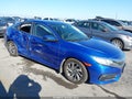 2018 Honda Civic — photo 1 of 16 | VIN 19XFC2F70JE012630