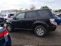 2009 Mercury Mariner — photo 14 of 16 | VIN 4M2CU81779KJ24080