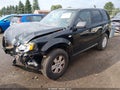 2009 Mercury Mariner — photo 2 of 16 | VIN 4M2CU81779KJ24080