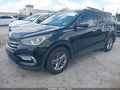 2017 Hyundai Santa Fe — photo 2 of 16 | VIN 5NMZU3LB1HH048595