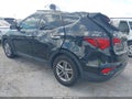 2017 Hyundai Santa Fe — photo 3 of 16 | VIN 5NMZU3LB1HH048595