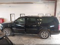 2007 GMC Yukon XL — photo 14 of 16 | VIN 1GKFK66807J303762