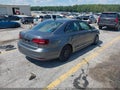 2016 Volkswagen Jetta — photo 4 of 17 | VIN 3VW267AJ1GM334405