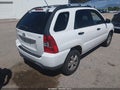 2009 Kia Sportage — photo 4 of 16 | VIN KNDJF724197576471